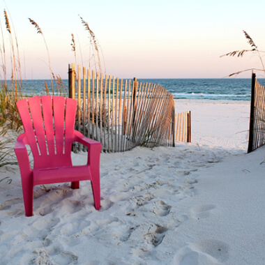 Beach Chair and Fence on the Beach in Gulf Shores, Alabama